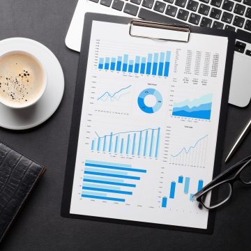 office workplace table with charts 2021 08 26 15 48 55 utc