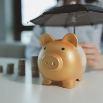 the financial worker held out a piggy bank an acc 2023 11 28 03 26 31 utc
